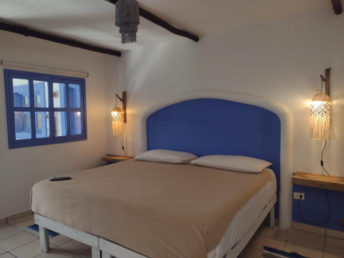 Mio Tulum Hotel Boutique المظهر الخارجي الصورة A bedroom in a hotel in Tunisia