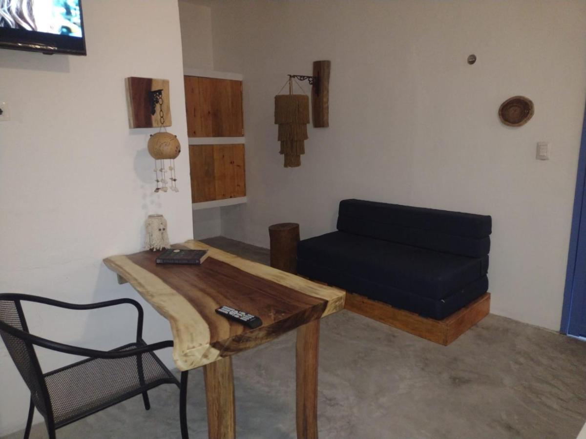 Mio Tulum Hotel Boutique المظهر الخارجي الصورة A living room in a hotel in Greece